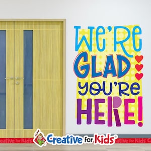 Welcome Wall Decal: 'We're Glad You're Here' Sign