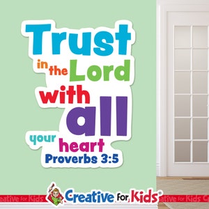 May include: A colorful wall decal with the text "Trust in the Lord with all your heart Proverbs 3:5". The decal is designed for children and features a rainbow color scheme.
