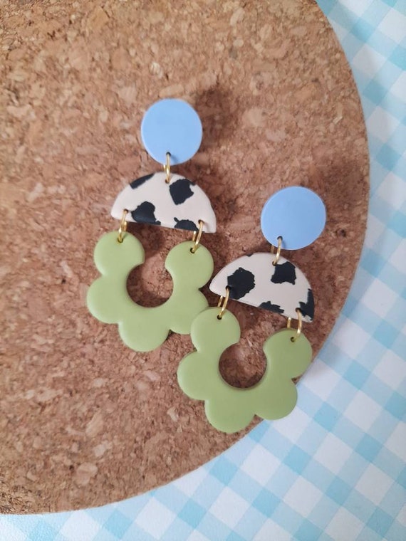 Polymer clay double green blue cow print daisy dangle earrings