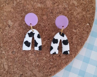 Polymer clay cow print mini arch earrings