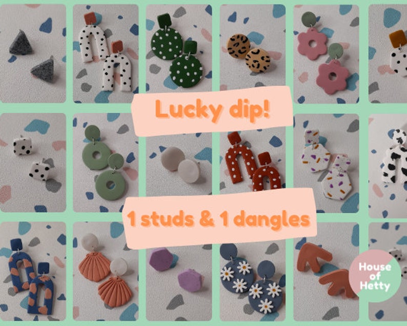May include: A collage of 12 pairs of handmade polymer clay earrings. The earrings are in various shapes, colors, and patterns. The text "Lucky dip! 1 studs & 1 dangles" is in the center of the collage. The text "House of Hetty" is in the bottom right corner of the collage.