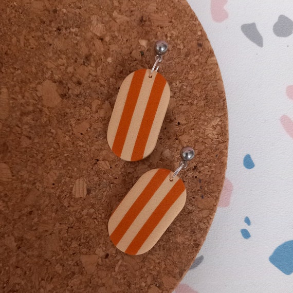 Pill shaped stripey polymer clay earrings