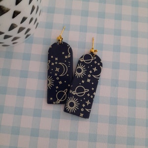 Celestial space pattern polymer clay long arch earrings