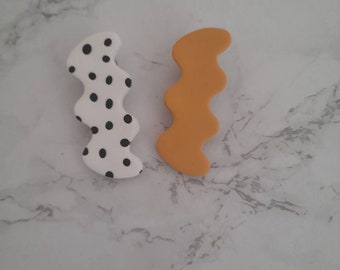 Dalmatian spot and yellow hair barrettes hair clips made from polymer clay. Set of 2