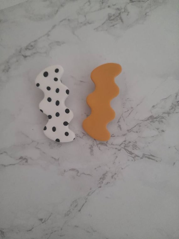 Dalmatian spot and yellow hair barrettes hair clips made from polymer clay. Set of 2