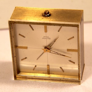 Small CYMA Amic Alarm Clock Gold Tone Brass Square Bedside Table Vintage Mechanical Wind Up Minimalist Mid Century