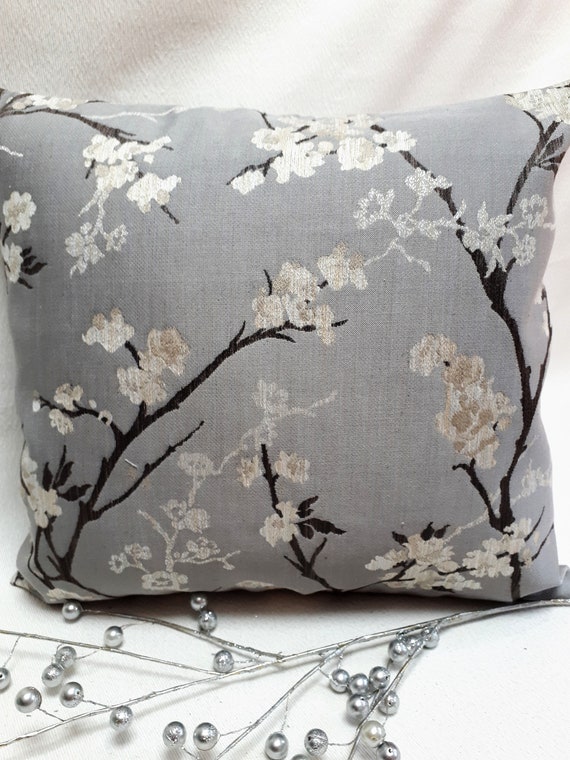 gray floral pillow