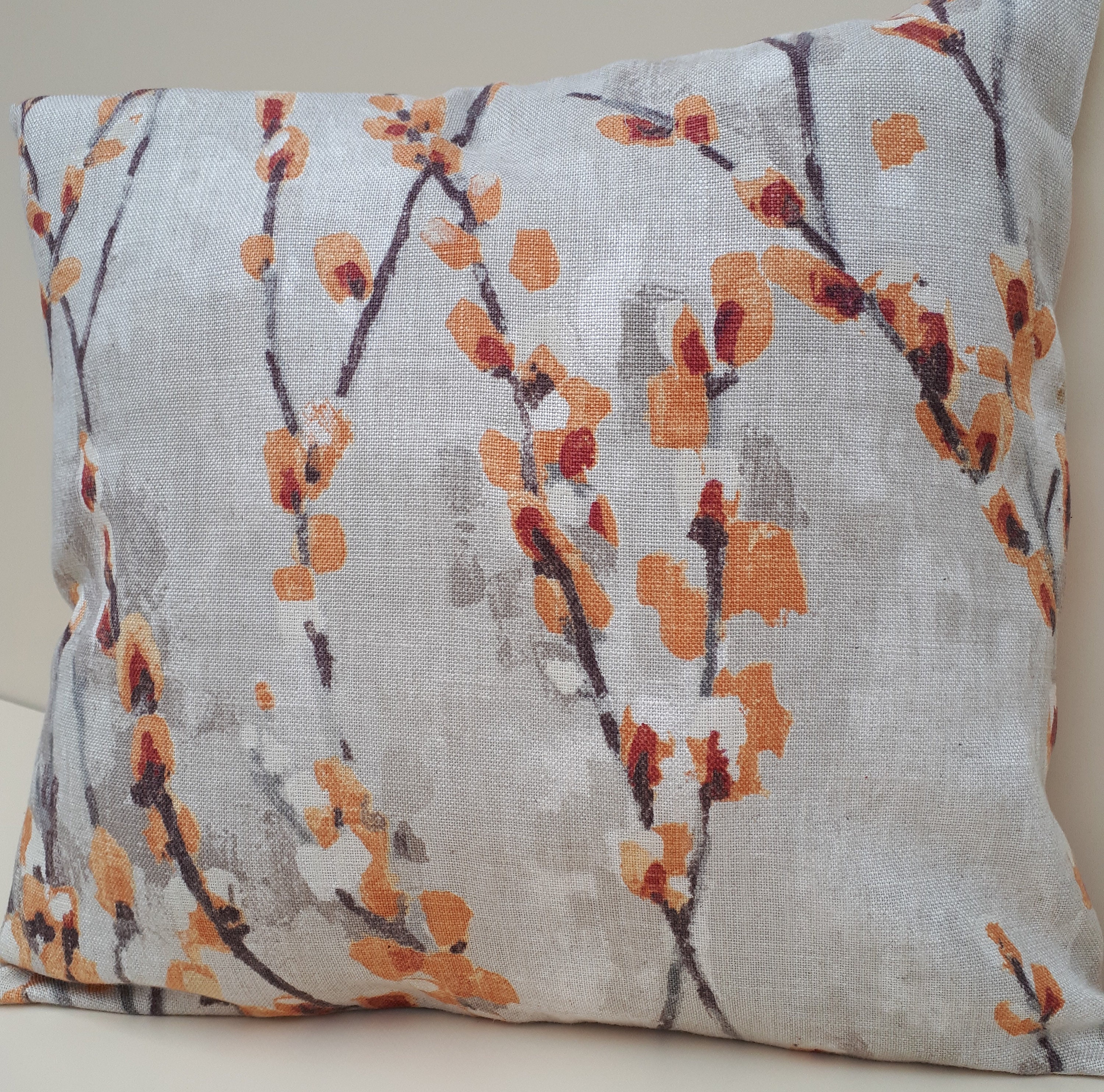 Orange and grey cushions top