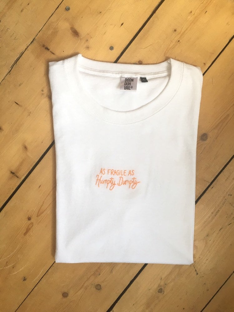 As Fragile As Humpty Dumpty - Embroidered T Shirt