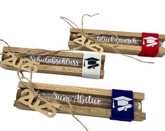 Dinero bellamente empaquetado: un regalo en efectivo para la graduación, el certificado de fin de estudios, el certificado de aprendizaje, etc. - dar dinero como regalo