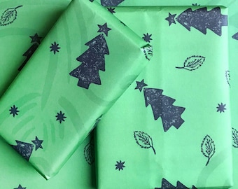 Christmas tree green giftwrap - Hand-drawn, lino cut inspired Christmas tree & magical scenery, 50x70cm