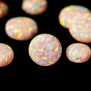 May include: A white ceramic mug with a black handle and the text "But First, Coffee" in a handwritten style. The mug is likely 11-15 ounces, perfect for a morning beverage.