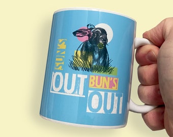Suns Out Buns Out, 11oz Ceramic Mug. Hand Printed in York. Blue Coffee Cup. Cute Bunny Rabbit drawing.