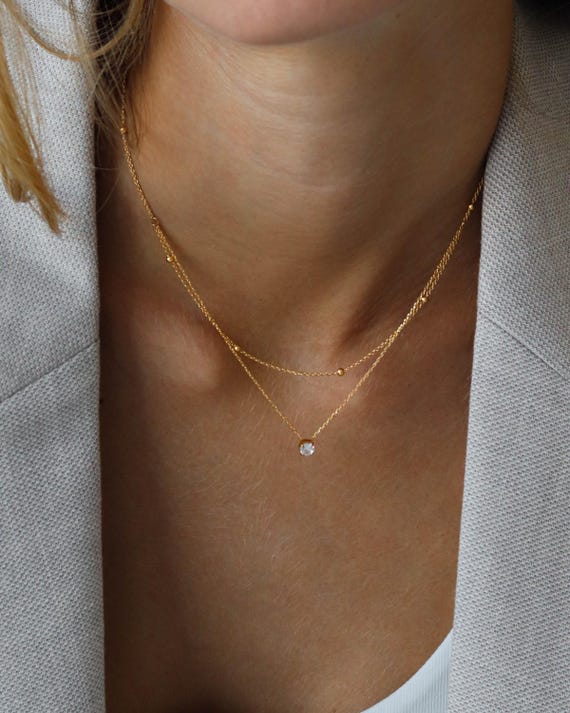 ★DNSR★ D layered necklace Mother Of Pearl Clover Layered Necklace in Gold | Altar'd State