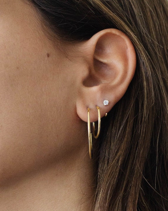 Acquisto all'ingrosso Orecchini a gancio per donna piccoli, delicati e micro incastonati con zirconia, occhio di gatto verde, personalizzati, dolci, versatili, alla moda ed eleganti confronto prezzi