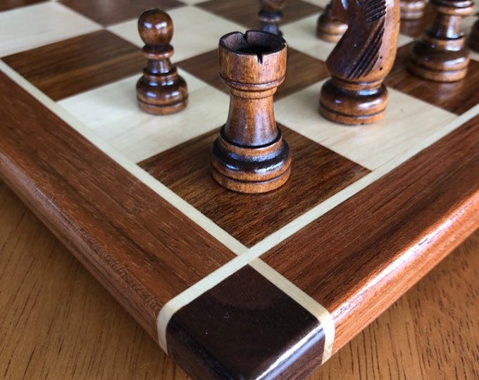 Jatoba Cherry and Maple squares, Jatoba borders with Black Walnut corners.