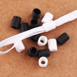 100-500 PCS Adjuster Stop cord Cord Lock White/Black stop Cord Lock Elastic for Face Mask Toggles Band Stopper Shape Fastener(sk20)
