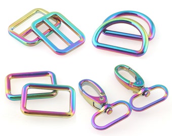 May include: Assortment of rainbow colored metal hardware for bags and accessories. Includes D-rings, swivel clasps, and rectangular buckles.