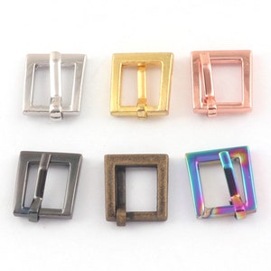 May include: Six metal buckle closures in different finishes: silver, gold, rose gold, black, and iridescent.