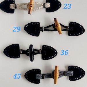 Alamaro eco-leather rope and bamboo toggles.Toggle closures