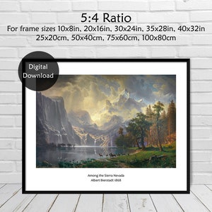 Puede incluir: Una descarga digital de una pintura titulada "Among the Sierra Nevada" de Albert Bierstadt, 1868. La pintura representa un paisaje monta&ntilde;oso con un lago, &aacute;rboles y una cascada. La pintura est&aacute; enmarcada en un marco negro.