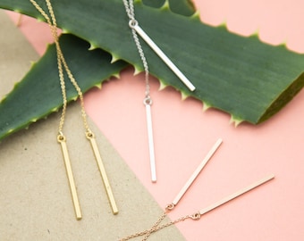 Minimalist threaded earring with gold bar. Gold-plated, rose gold-plated, or rhodium-plated brass. Lemon and pink. Handmade jewelry.