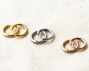 Mini hoop earrings stainless steel golden, black, pure or rose gold plated. Whoops! 12mm diameter. Waterproof