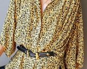vintage 80 s Nicole Miller relaxed yellow blouse. Light weight yellow top with black pattern.