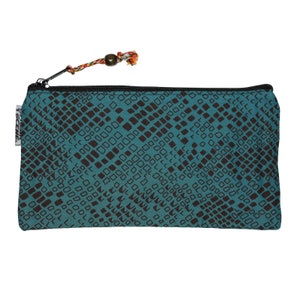May include: A teal zippered pouch with a black and white geometric pattern. The pouch has a black zipper and a colorful tassel.