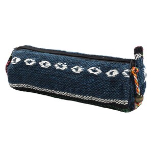May include: A blue and white patterned pencil case with a zipper closure. The case has a woven texture and a tassel.