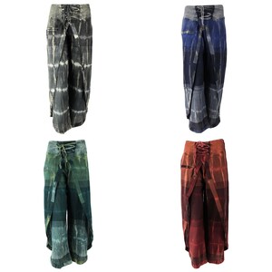 May include: Four pairs of tie-dye pants with a lace-up closure at the waist. The pants are in different colors, including green, blue, gray, and red.