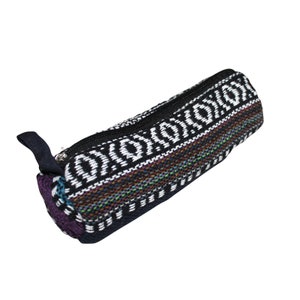 May include: Black and white patterned pencil case with a zipper closure. The case has a purple, blue and green stripe near the bottom.