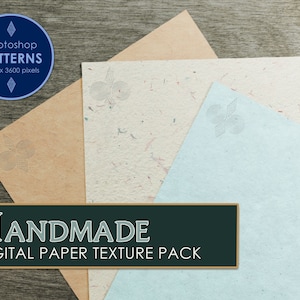 May include: Three sheets of handmade paper with a subtle speckled texture. The paper is light brown, cream, and light blue. Each sheet has a decorative design in the upper right corner.