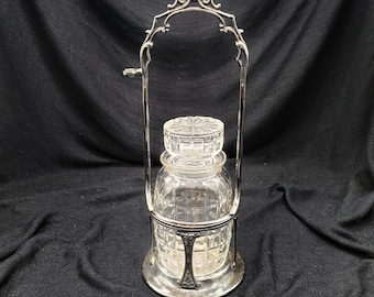 Antique Victorian Cut Glass Pickle Castor Jar In a Silver Plate Holder.