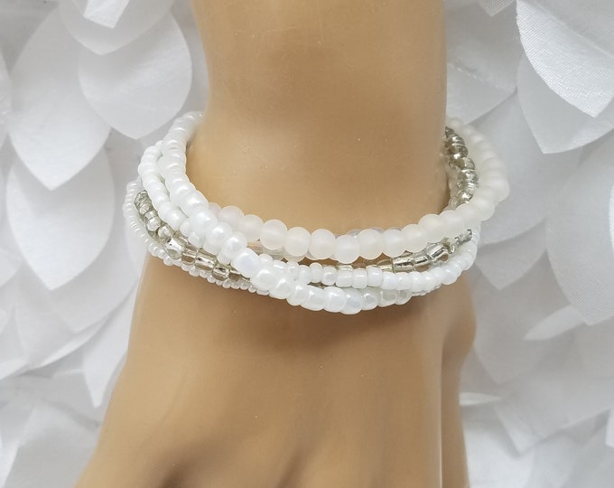 Multi-Strand  White and Pink Tone Bracelet