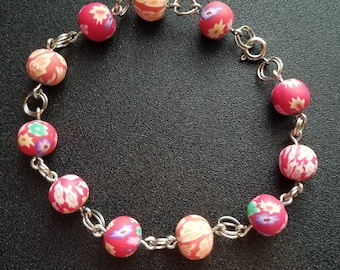 Hot pink floral polymer clay beaded bracelet