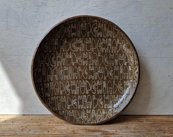Large serving platter with carved geometric shapes, dark brown stoneware pottery, tribal art, durable quality ceramics