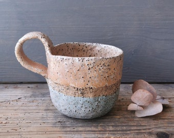 Rustic ceramic mug with high handle