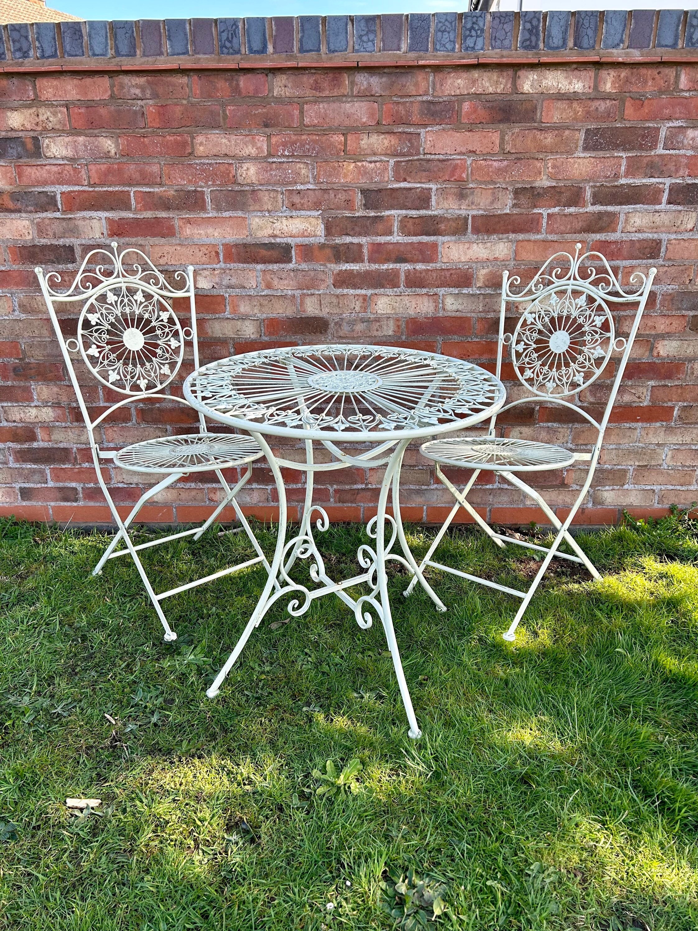 Cream metal garden sale table