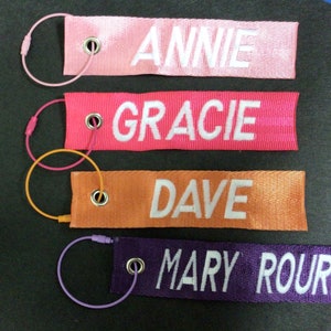 Custom embroidered luggage/ gear/bag tag 1.5 x 6 to 7 inches 11 colors