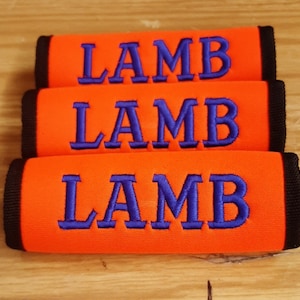 One Luggage handle wrap personalized embroidered