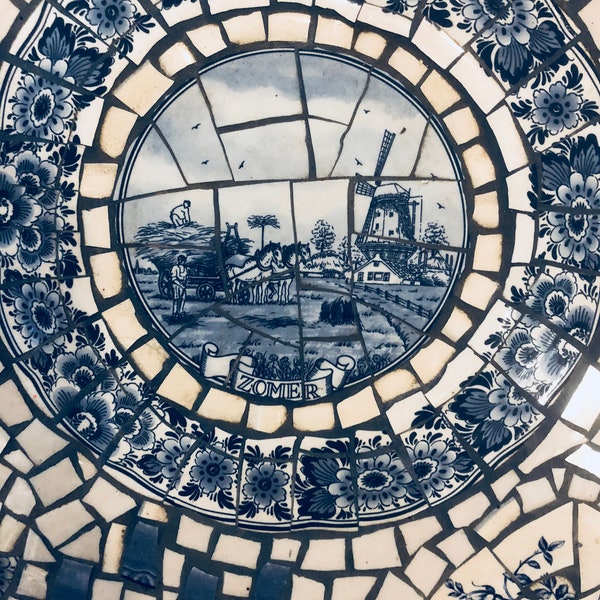 Mosaic cafe table on a wrought iron base. Blue Willow china. Broken Ceramic tiles.  Gift idea for garden lover.