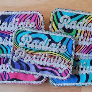 Radiate Positivity handmade sew on patch embroidered on colorful fabric