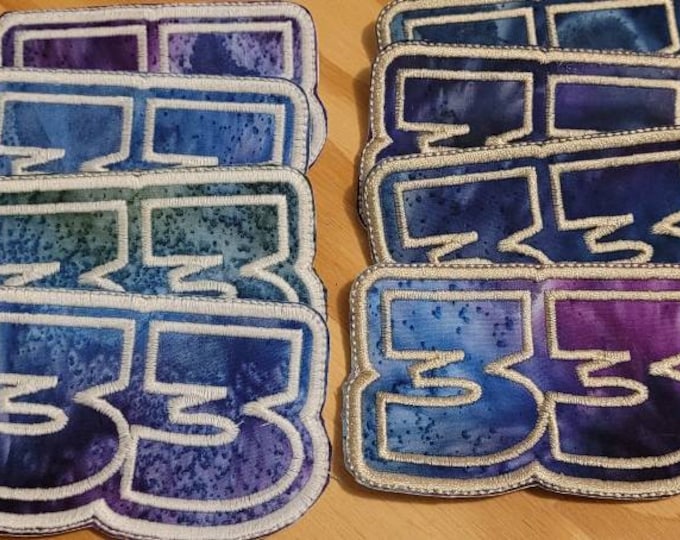 33 handmade sew on patch.  Available in silver thread, or white thread that glows in the dark BMFS fan art patch