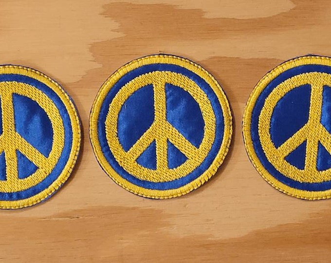 Peace sign handmade embroidered sew on patch stitched in the colors of Ukraine give peace a chance