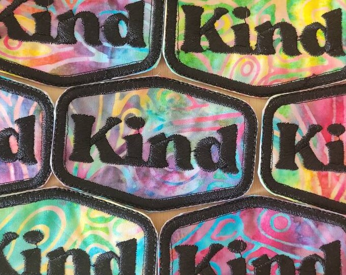 Kind handmade sew on embroidered patch stitched on Batik fabric