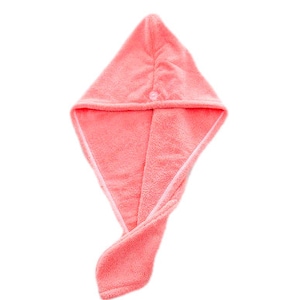 May include: A pink microfiber hair towel with a button closure. The towel is designed to wrap around the head and absorb moisture after showering.