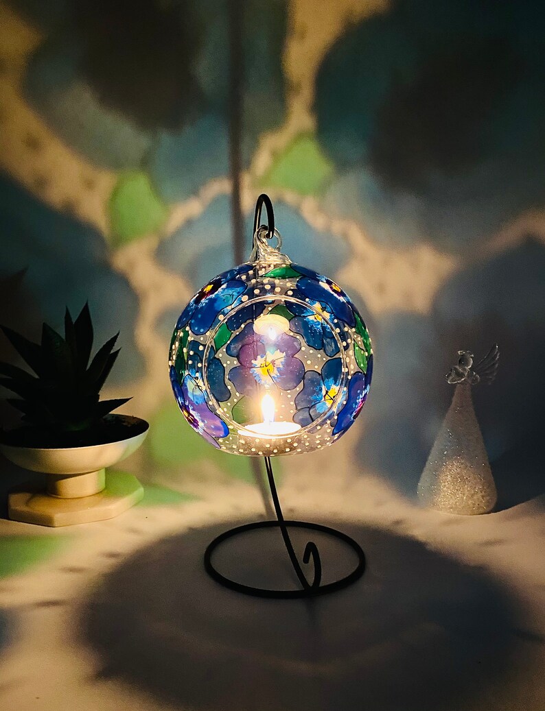 Hand Painted hanging glass candle holder with metal stand, with blue pansies and green leaves. Great choice as a unique gift for Mothers Day, Christmas Gift, Unique Birthday Gift, this glass tealight holder will truly impress the receiver.