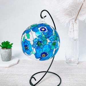 Hand Painted hanging glass candle holder with metal stand, with blue pansies and green leaves. Great choice as a unique gift for Mothers Day, Christmas Gift, Unique Birthday Gift, this glass tealight holder will truly impress the receiver.