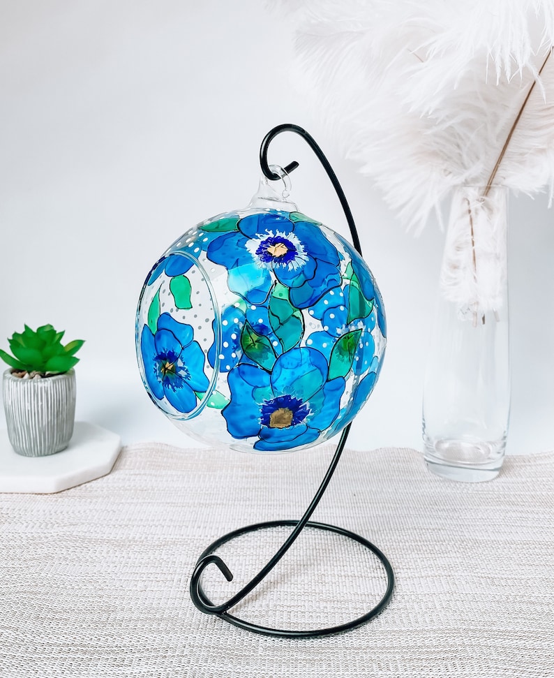 Hand Painted hanging glass candle holder with metal stand, with blue pansies and green leaves. Great choice as a unique gift for Mothers Day, Christmas Gift, Unique Birthday Gift, this glass tealight holder will truly impress the receiver.